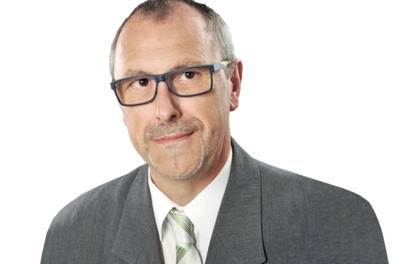 Ein sympathisches Portraitfoto von Jürgen Erdmann