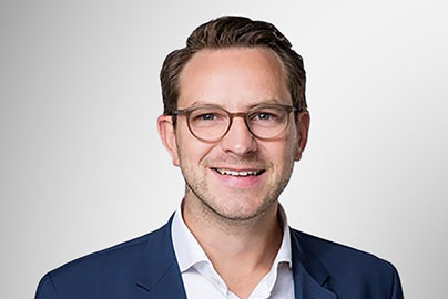 Portraitbild von Florian Buchen.